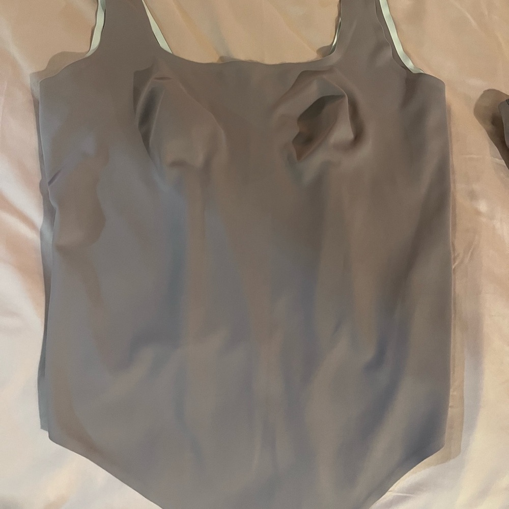 Lot: parade body suit and bralette